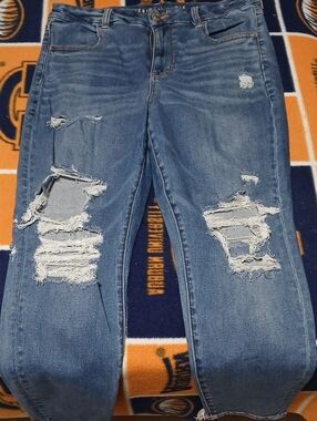 American Eagle Outfitters Distressed Boyfriend Jeans in Medium Blue